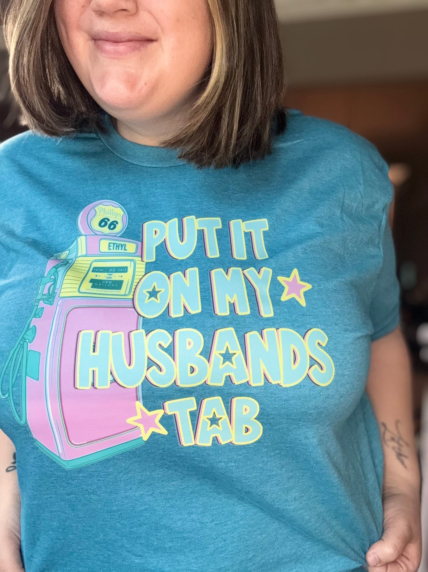 Put it on my husbands tab Gildan tee